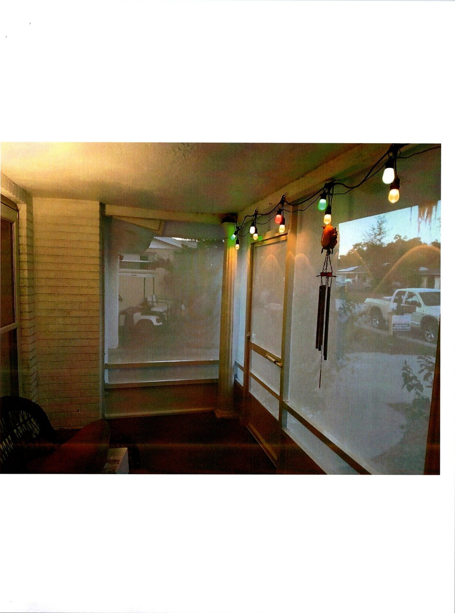White sunscreen lanai — after