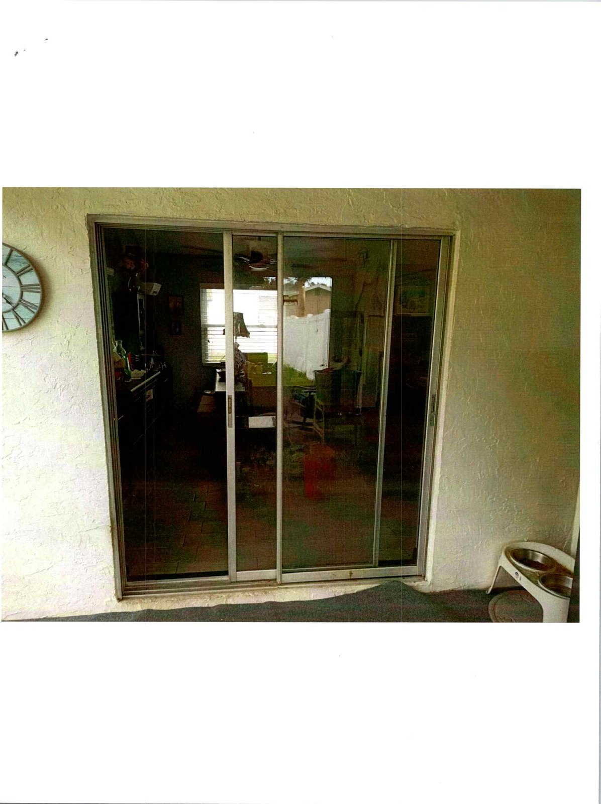 SLIDING GLASS DOOR TO FRENCH DOOR CONVERSION — photo 1