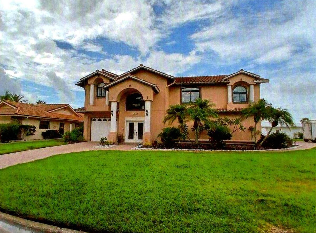 Two-story Florida home with new impact windows and doors