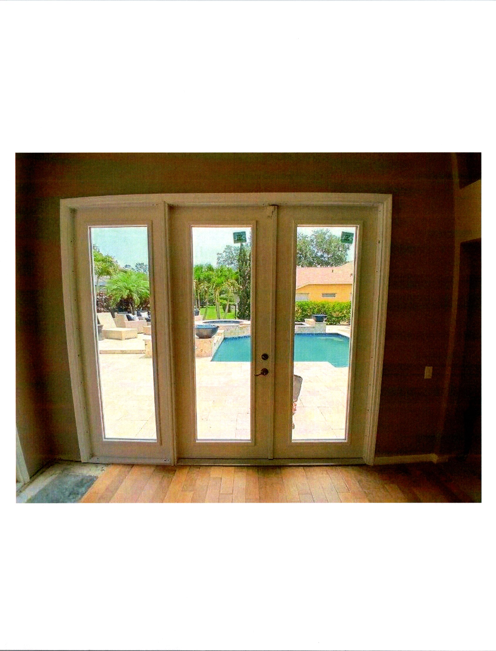 Removed Triple Set of Windows & Installed a French Door with Oversized Sidelite Clear Impact Glass